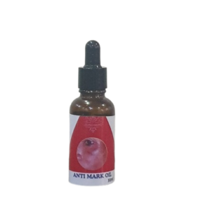 face oil in brown bottle and red label for removing melasma and sun burn